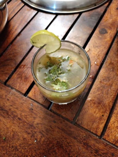 Tasty Lemon Coriander Soup cooked by COOX chefs cooks during occasions parties events at home