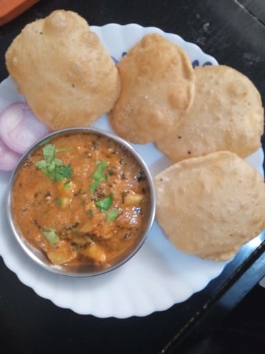 Tasty Poori Bhaji cooked by COOX chefs cooks during occasions parties events at home