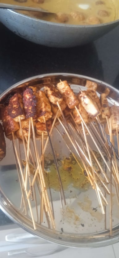 Tasty Thai Paneer Satay cooked by COOX chefs cooks during occasions parties events at home