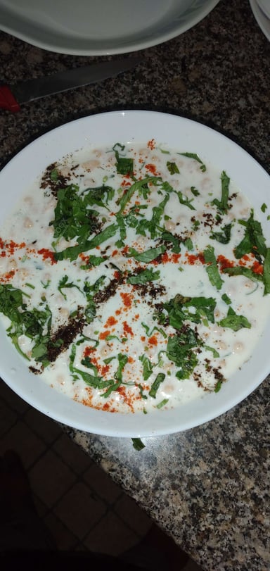 Tasty Plain Raita cooked by COOX chefs cooks during occasions parties events at home