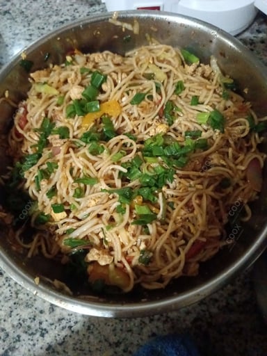 Tasty Chicken Hakka Noodles cooked by COOX chefs cooks during occasions parties events at home