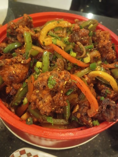 Tasty Crispy Chilli Lamb cooked by COOX chefs cooks during occasions parties events at home