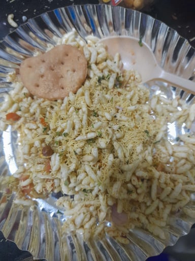 Tasty Bhel Puri cooked by COOX chefs cooks during occasions parties events at home