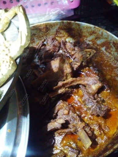 Tasty Mutton Rogan Josh cooked by COOX chefs cooks during occasions parties events at home