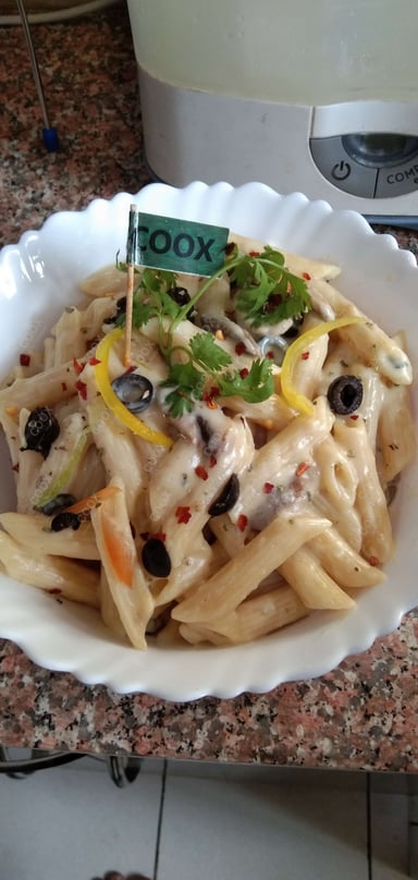 Tasty Pasta in White Sauce cooked by COOX chefs cooks during occasions parties events at home