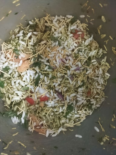 Tasty Bhel Puri cooked by COOX chefs cooks during occasions parties events at home
