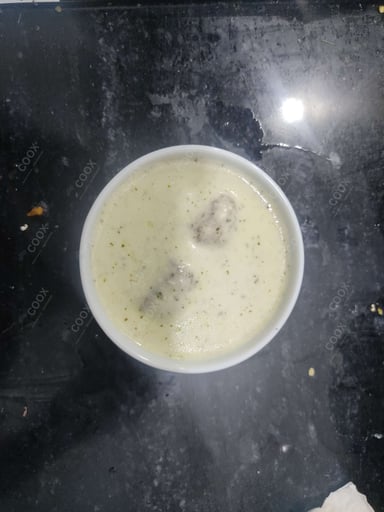 Tasty Malai Kofta (White Gravy) cooked by COOX chefs cooks during occasions parties events at home