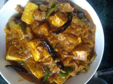 Tasty Kadhai Chicken cooked by COOX chefs cooks during occasions parties events at home