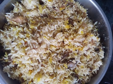 Tasty Chicken Biryani cooked by COOX chefs cooks during occasions parties events at home