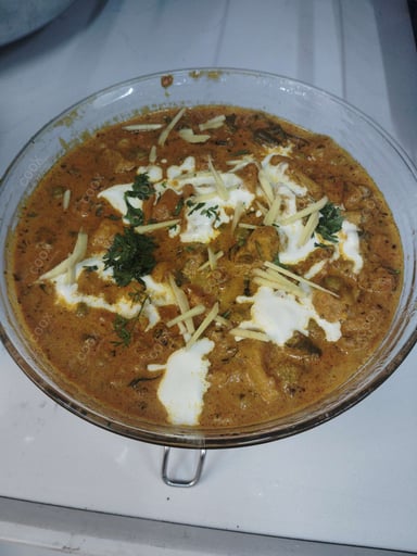 Tasty Veg Korma cooked by COOX chefs cooks during occasions parties events at home