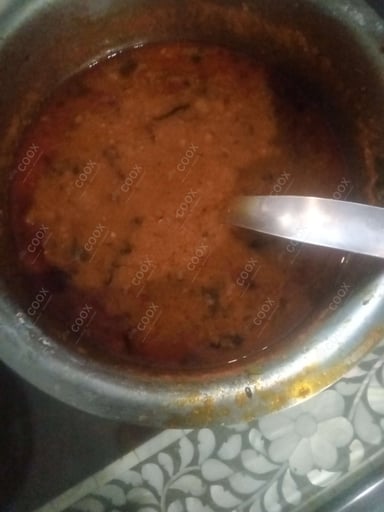Tasty Aloo Rasedar cooked by COOX chefs cooks during occasions parties events at home