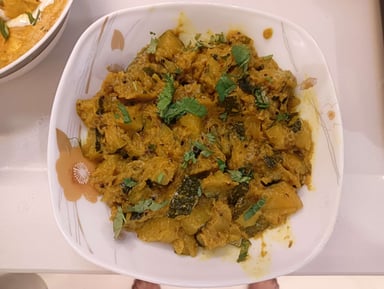 Tasty Kaddu ki Sabzi (Sitafal) cooked by COOX chefs cooks during occasions parties events at home