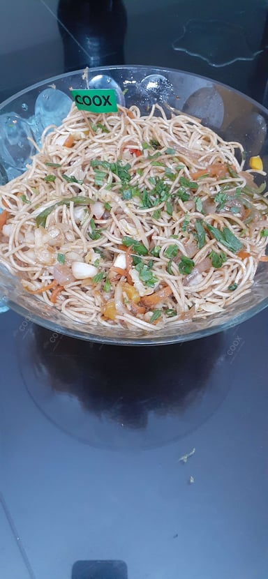 Tasty Chilli Garlic Noodles cooked by COOX chefs cooks during occasions parties events at home