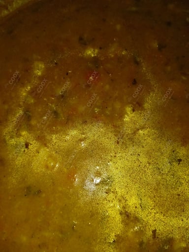 Tasty Aloo Gravy cooked by COOX chefs cooks during occasions parties events at home