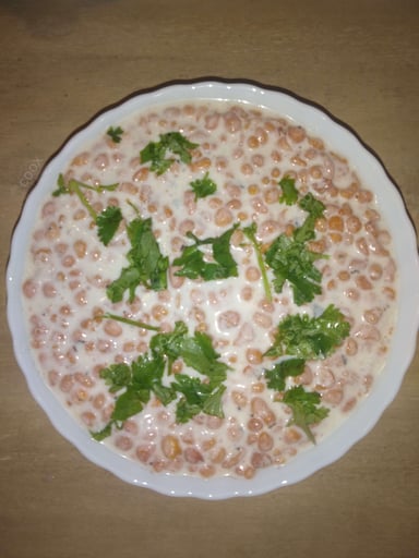 Tasty Plain Raita cooked by COOX chefs cooks during occasions parties events at home
