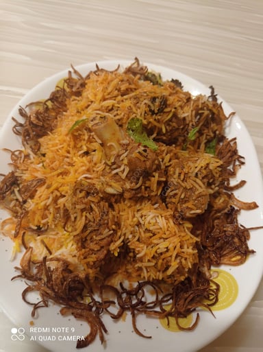 Tasty Mutton Biryani cooked by COOX chefs cooks during occasions parties events at home