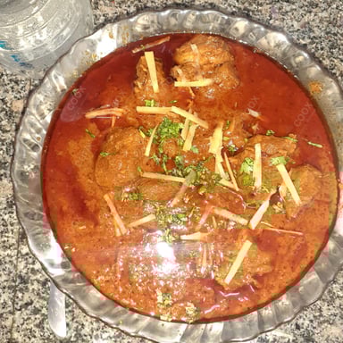 Tasty Mutton Rogan Josh cooked by COOX chefs cooks during occasions parties events at home