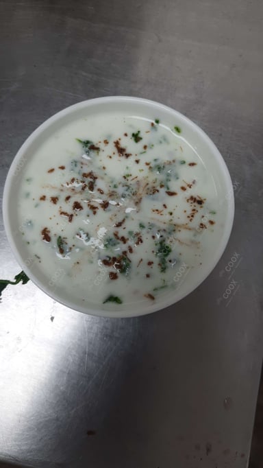Tasty Plain Raita cooked by COOX chefs cooks during occasions parties events at home