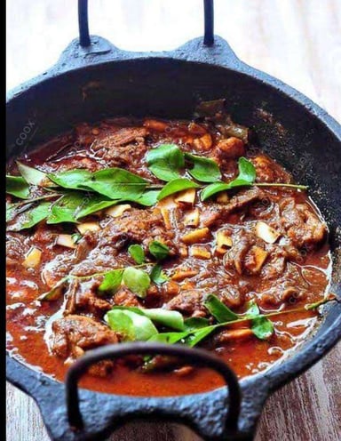 Tasty Kerala Fish Curry cooked by COOX chefs cooks during occasions parties events at home
