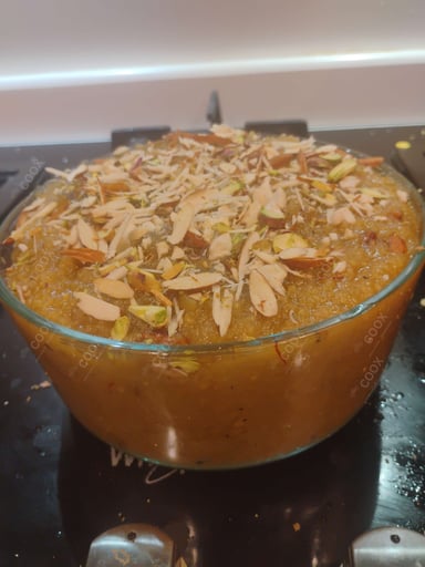 Tasty Moong Dal Halwa cooked by COOX chefs cooks during occasions parties events at home