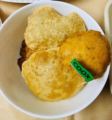 Tasty Pooris & Bedmis cooked by COOX chefs cooks during occasions parties events at home