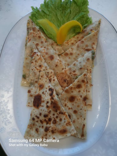 Tasty Veg Quesadillas cooked by COOX chefs cooks during occasions parties events at home