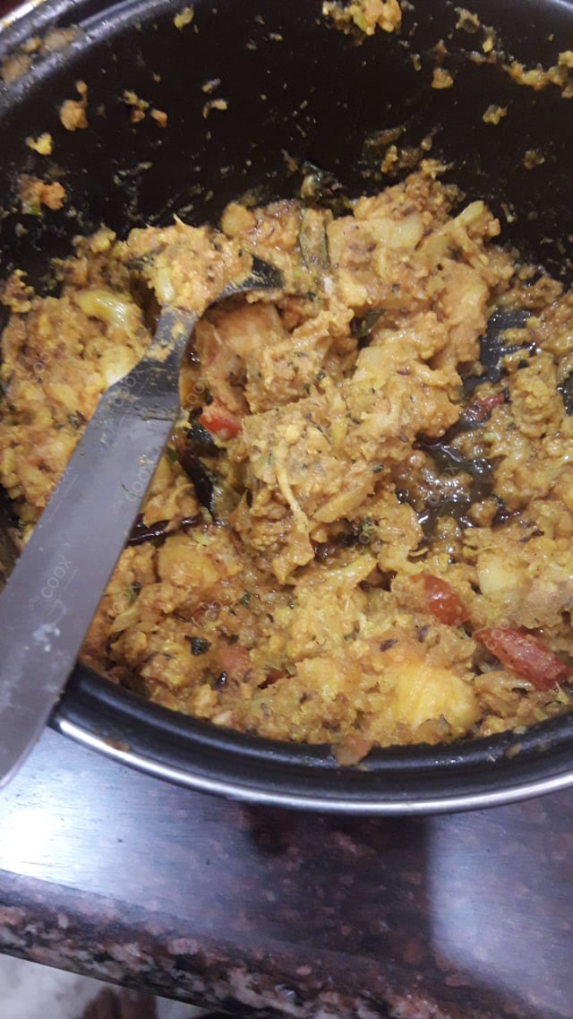 Tasty Aloo Gobhi cooked by COOX chefs cooks during occasions parties events at home