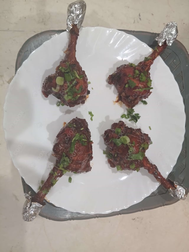 Delicious Chicken Lollipop prepared by COOX