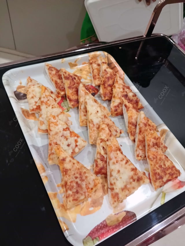 Tasty Margherita Pizza cooked by COOX chefs cooks during occasions parties events at home