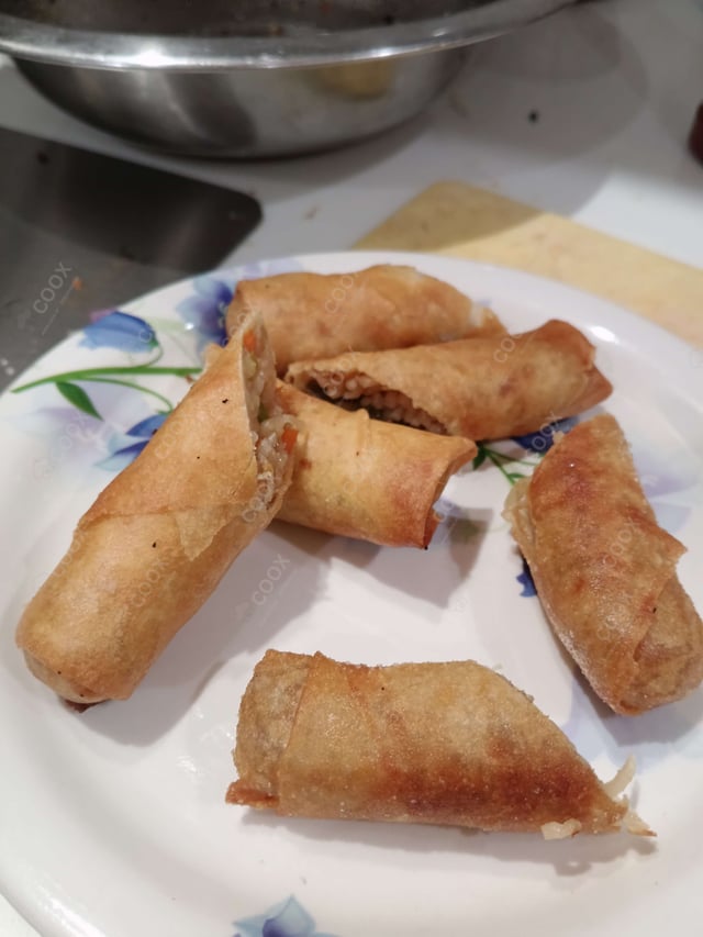 Delicious Veg Spring Rolls prepared by COOX