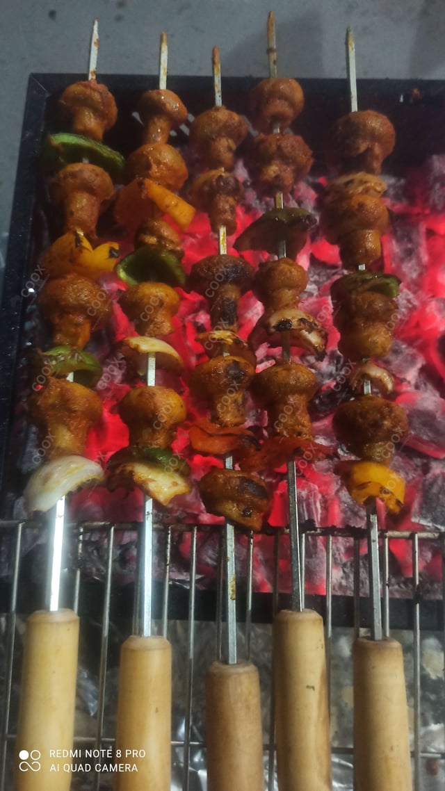 Tasty Mushroom Tikka cooked by COOX chefs cooks during occasions parties events at home