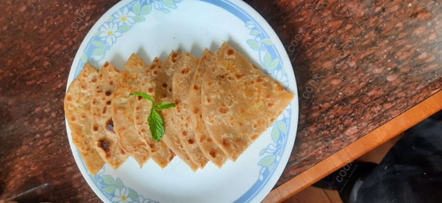 Delicious Stuffed Paranthas prepared by COOX