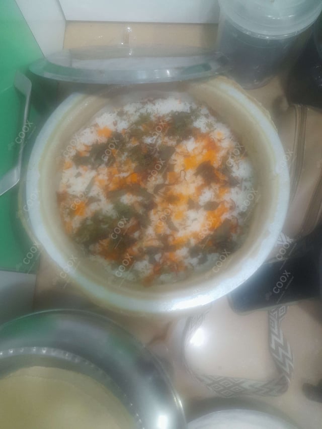 Delicious Chicken Biryani prepared by COOX