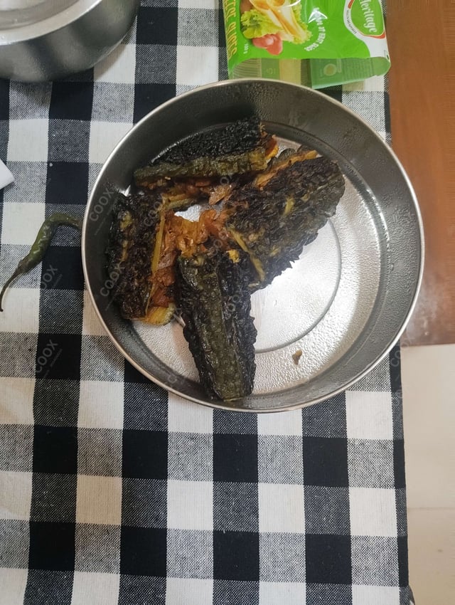 Delicious Karele ki Sabzi prepared by COOX