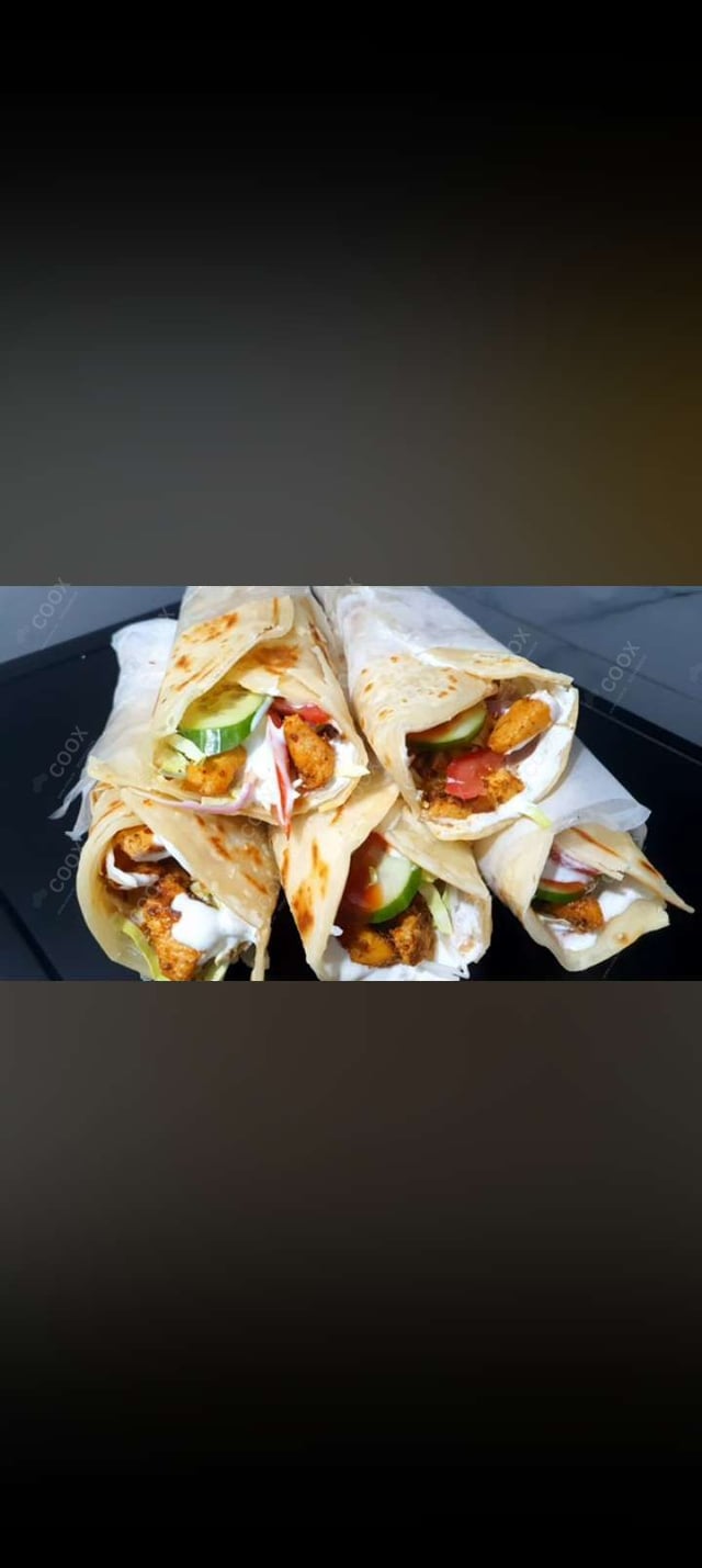 Tasty Chicken Kathi Rolls cooked by COOX chefs cooks during occasions parties events at home