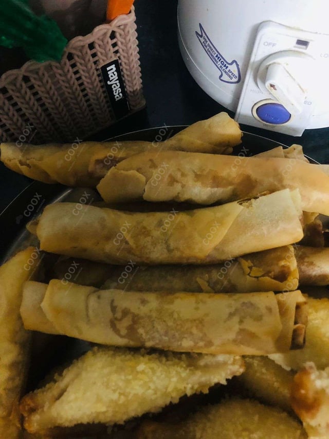 Delicious Veg Spring Rolls prepared by COOX