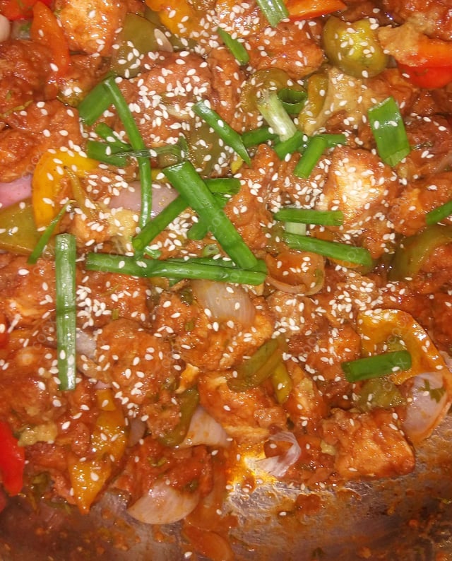 Tasty Chilli  Chicken cooked by COOX chefs cooks during occasions parties events at home