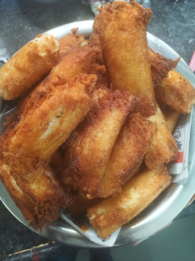 Delicious Dahi ke Sholey prepared by COOX