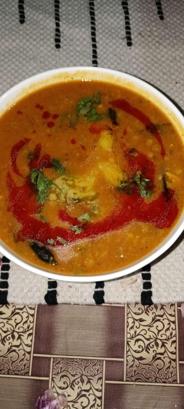 Tasty Palak Dal cooked by COOX chefs cooks during occasions parties events at home