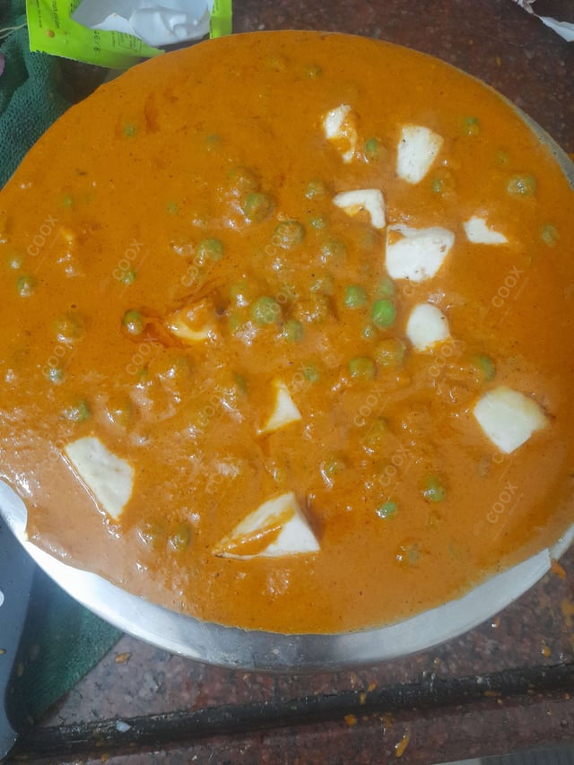 Delicious Matar Paneer prepared by COOX