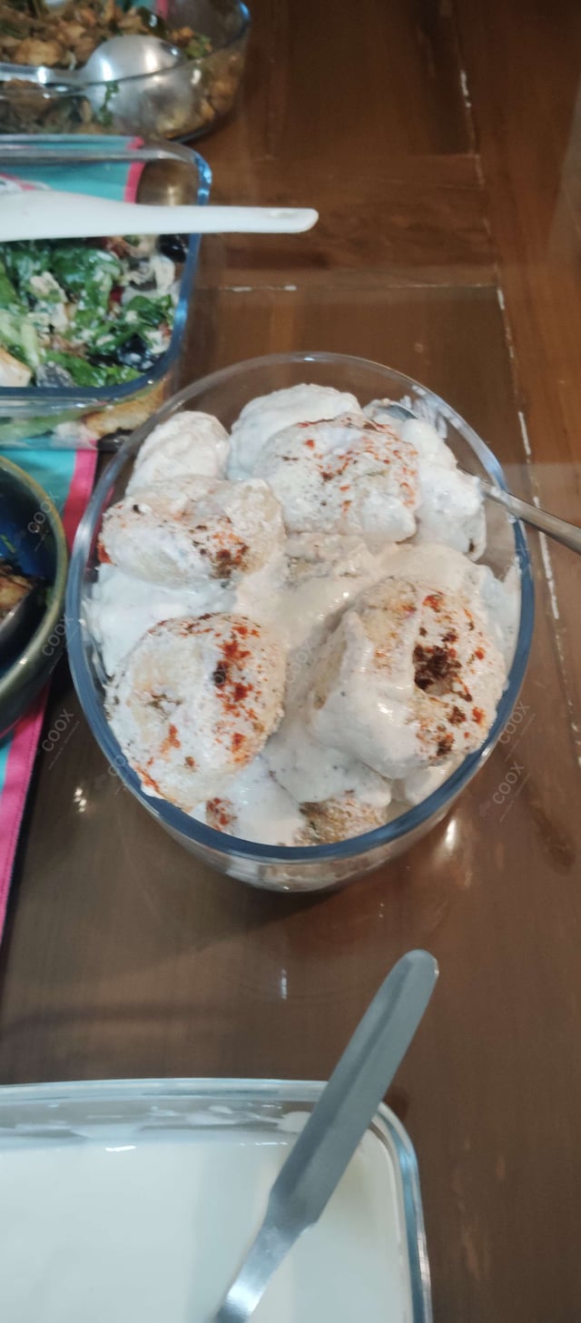 Tasty Dahi Vada cooked by COOX chefs cooks during occasions parties events at home