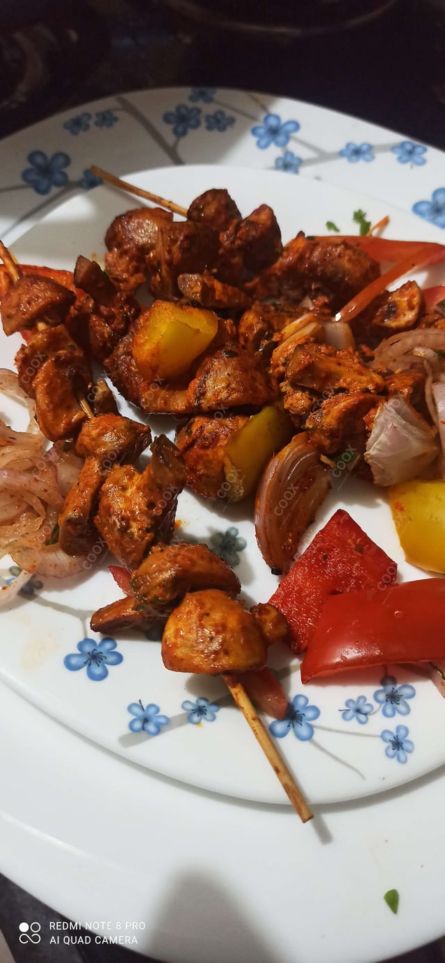 Tasty Mushroom Tikka cooked by COOX chefs cooks during occasions parties events at home