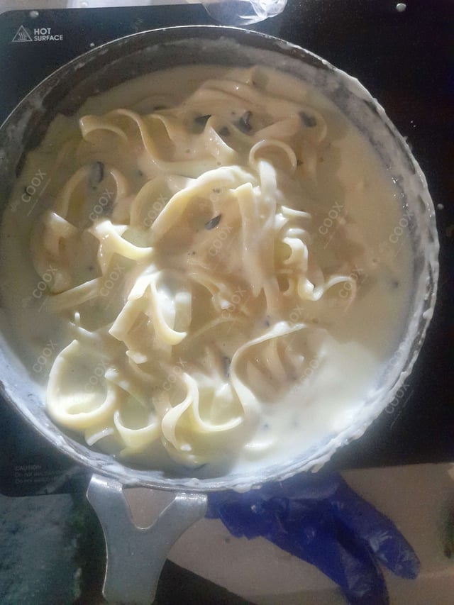 Delicious Ravioli in Pink Sauce prepared by COOX