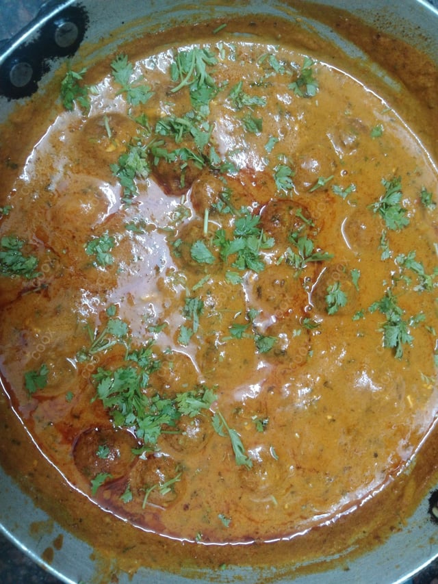 Delicious Malai Kofta (Orange Gravy) prepared by COOX