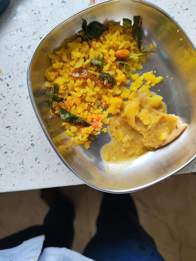 Tasty Poha cooked by COOX chefs cooks during occasions parties events at home