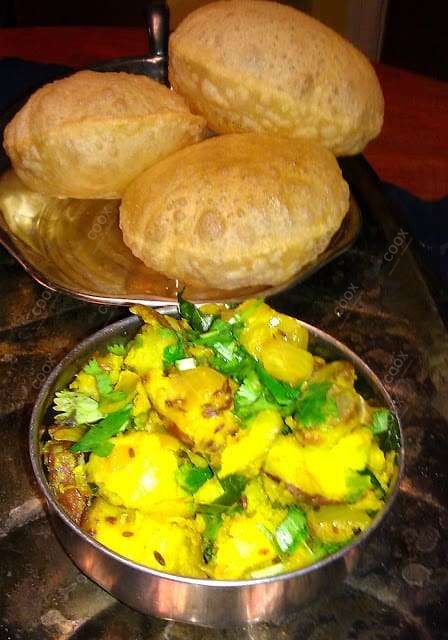 Delicious Poori Bhaji prepared by COOX
