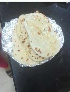 Tasty Naan (Butter / Garlic) cooked by COOX chefs cooks during occasions parties events at home