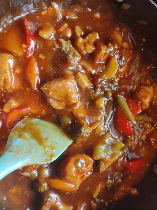 Delicious Chicken In Burnt Garlic Sauce prepared by COOX