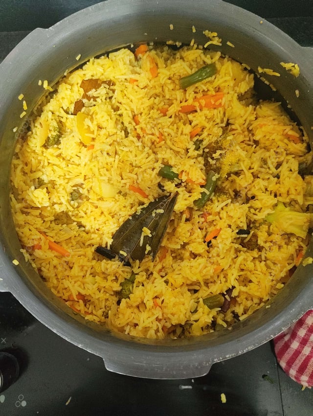 Delicious Veg Biryani prepared by COOX