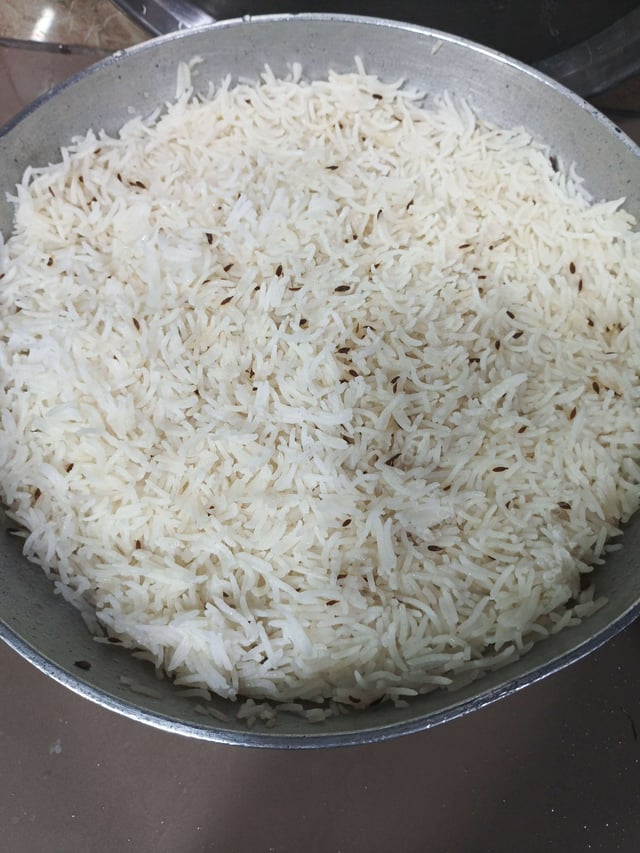 Delicious Jeera Rice prepared by COOX